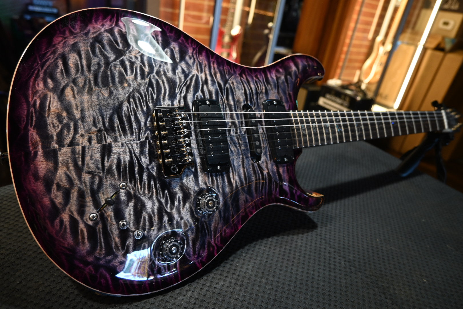 PRS Wood Library Modern Eagle V 10-Top Quilt Swamp Ash Figured Maple Neck - Charcoal Purple Burst Guitar #9653 - Danville Music